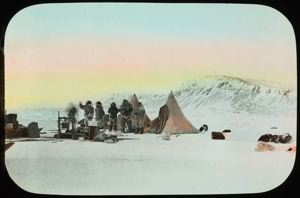 Image of Eskimos [Inuit] in the Field, Matthew Henson i[George Borup] n Center of Group 